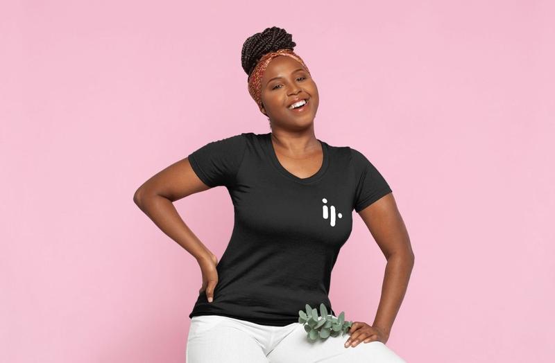 A smiling woman wearing a black shirt with the OakBury mark